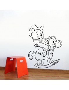 Sticker Winnie l'ourson sur cheval à bascule